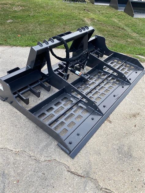 ground leveling attachment for skid steer|best equipment to level land.